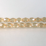 Czech Glass Fire Polish Bead - Oval 07x5MM LUMI COATED LT TOPAZ