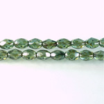 Czech Glass Fire Polish Bead - Oval 07x5MM LUMI COATED GREEN