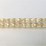 Czech Glass Fire Polish Bead - Oval 06x4MM LUMI COATED LT TOPAZ