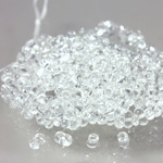 Preciosa Czech Glass Seed Bead - Farfalle 02x4MM CRYSTAL 00050 Strung