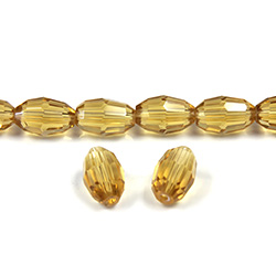 Chinese Cut Crystal Bead - Oval 09x6MM TOPAZ